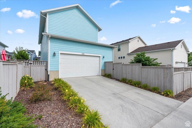 5131 W Mellow Way S, South Jordan, UT 84009 - view of home's exterior featuring a gate and concrete driveway