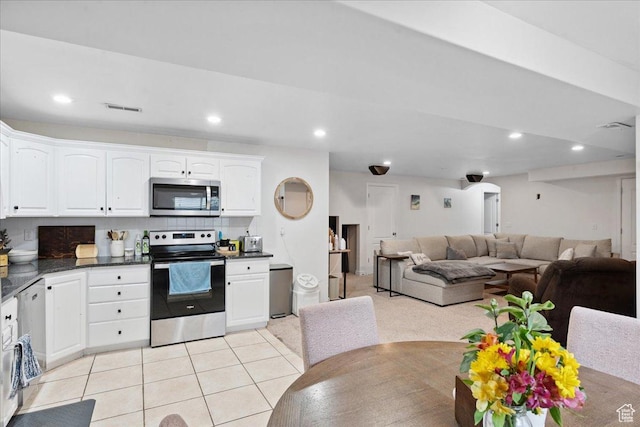656 W 1310 N, Lehi, UT 84043 - kitchen featuring stainless steel appliances, open floor plan, white cabinetry, recessed lighting, and light tile patterned floors