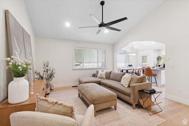 656 W 1310 N, Lehi, UT 84043 - living room featuring arched walkways, light wood-style floors, ceiling fan, high vaulted ceiling, and recessed lighting