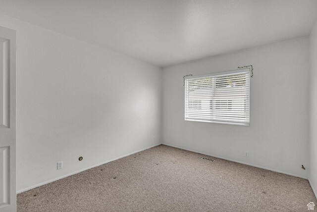 607 E 4030 S, Murray, UT 84107 - carpeted spare room featuring baseboards