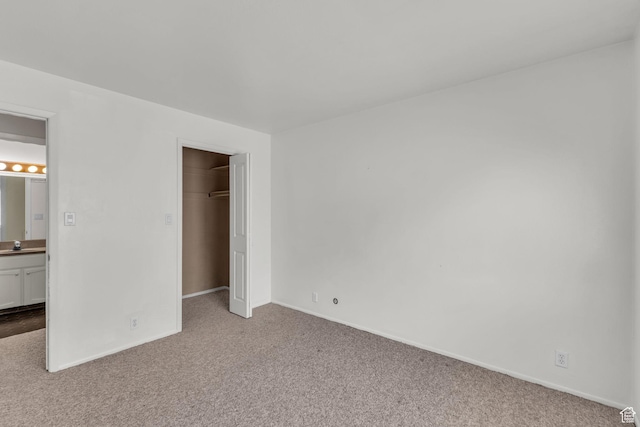 607 E 4030 S, Murray, UT 84107 - unfurnished bedroom featuring carpet floors and a closet