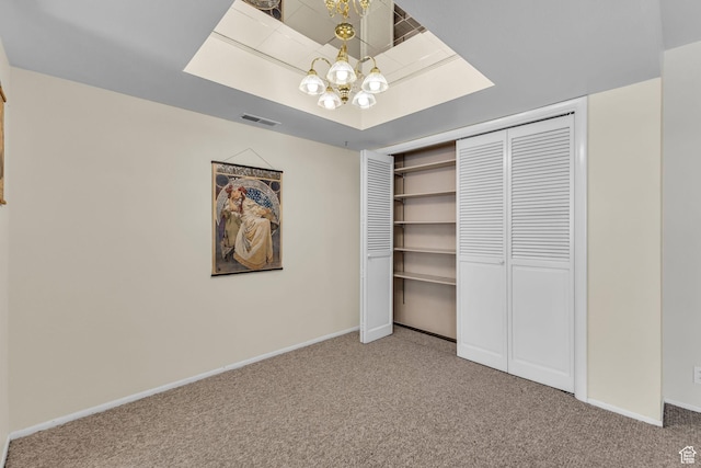607 E 4030 S, Murray, UT 84107 - unfurnished bedroom with carpet floors, a chandelier, and a closet