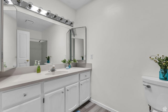 607 E 4030 S, Murray, UT 84107 - bathroom with vanity and wood finished floors