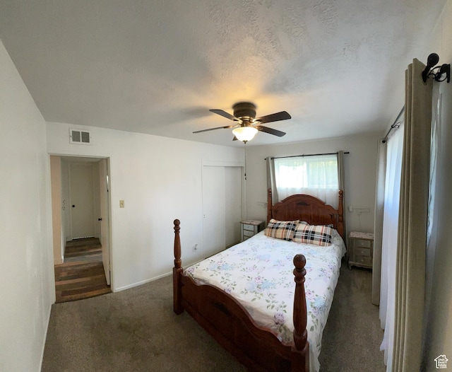 4825 S 4480 W, Kearns, UT 84118 - bedroom featuring carpet, a ceiling fan, a closet, and a textured ceiling
