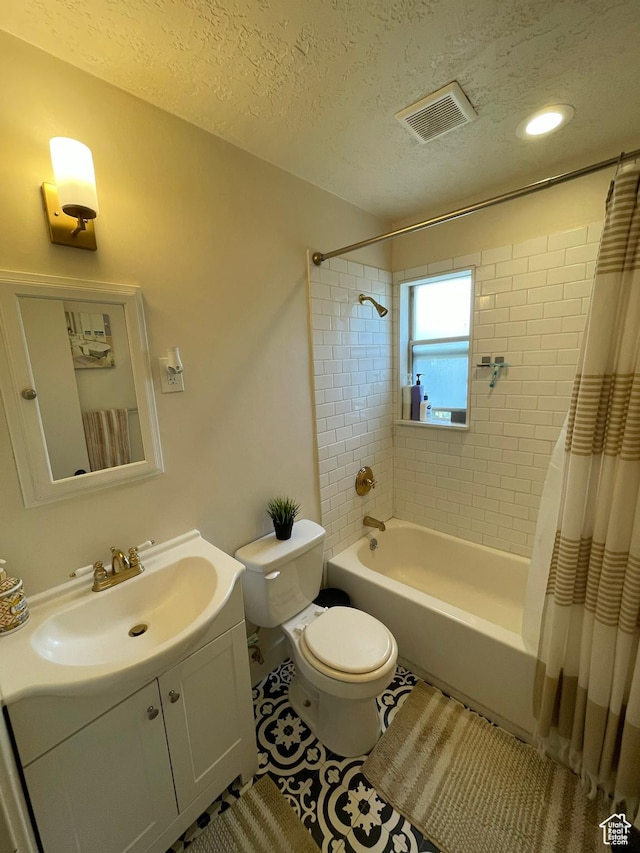 4825 S 4480 W, Kearns, UT 84118 - bathroom featuring vanity, shower / bath combo, a textured ceiling, tile patterned floors, and recessed lighting