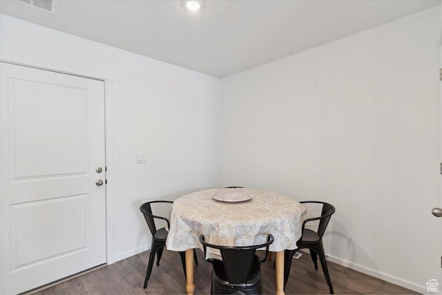 1826 N Blue Iris Ave, Tooele, UT 84074 - dining space featuring baseboards and wood finished floors