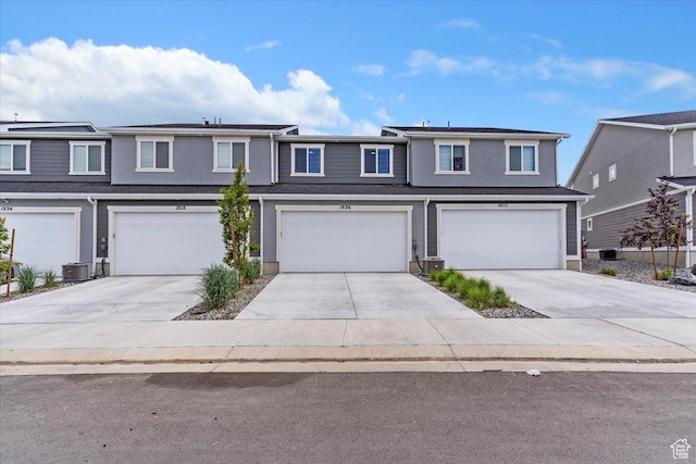 1826 N Blue Iris Ave, Tooele, UT 84074 - townhome / multi-family property featuring a garage and driveway