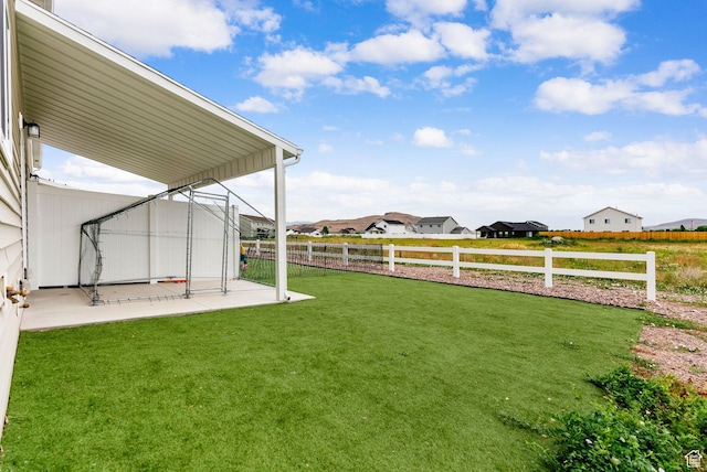 87 E Legacy Dr, Franklin, ID 83237 - fenced backyard with a patio