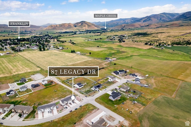 87 E Legacy Dr, Franklin, ID 83237 - aerial view of property's location featuring a mountainous background and rural landscape