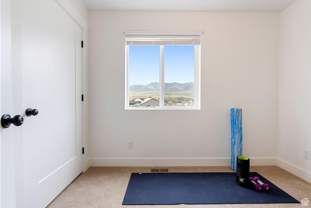 87 E Legacy Dr, Franklin, ID 83237 - exercise room featuring light colored carpet and a mountain view