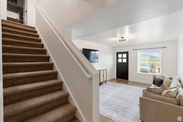 87 E Legacy Dr, Franklin, ID 83237 - entrance foyer featuring stairs and light wood-type flooring