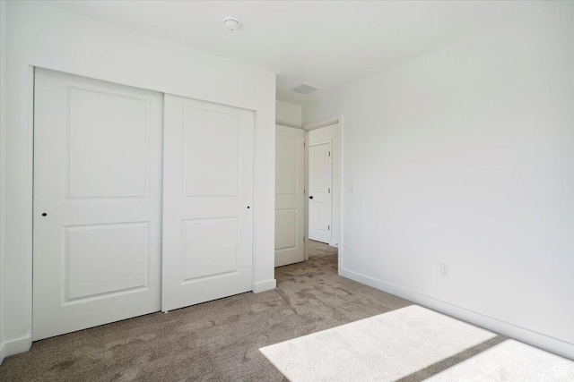 723 N Plainsman Dr Unit 109, Spanish Fork, UT 84660 - unfurnished bedroom featuring carpet and a closet