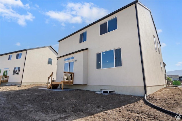 723 N Plainsman Dr Unit 109, Spanish Fork, UT 84660 - back of house featuring stucco siding