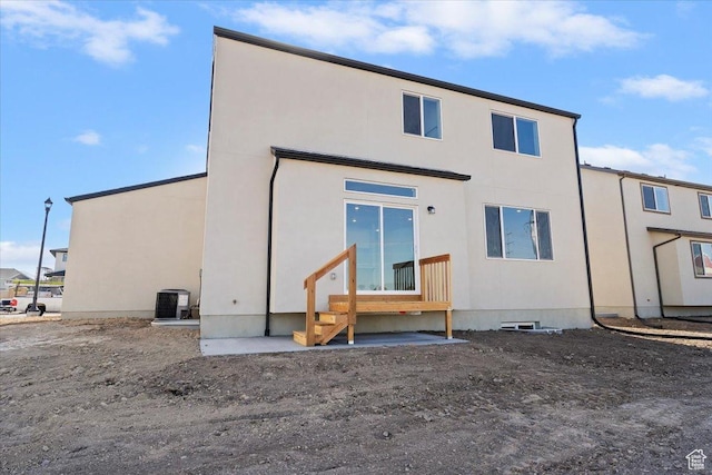 723 N Plainsman Dr Unit 109, Spanish Fork, UT 84660 - rear view of property featuring stucco siding and entry steps