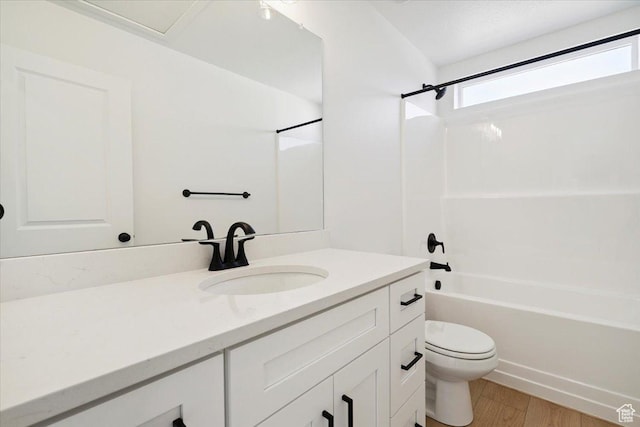 723 N Plainsman Dr Unit 109, Spanish Fork, UT 84660 - bathroom with shower / washtub combination, vanity, and wood finished floors