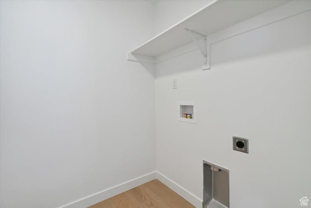 723 N Plainsman Dr Unit 109, Spanish Fork, UT 84660 - washroom featuring washer hookup, hookup for an electric dryer, and light wood finished floors