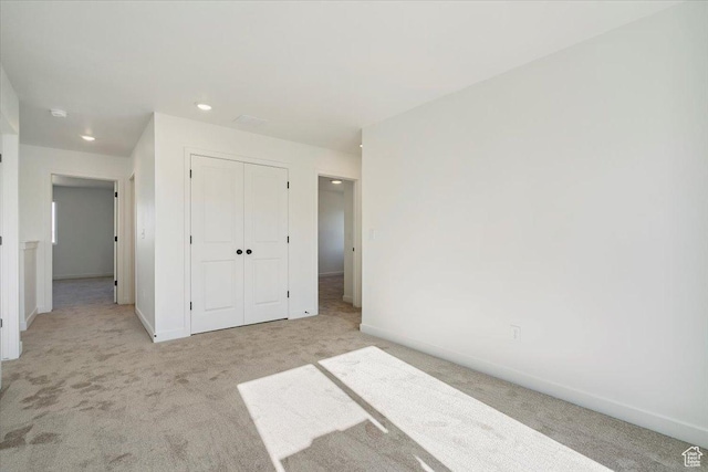 723 N Plainsman Dr Unit 109, Spanish Fork, UT 84660 - unfurnished bedroom with carpet floors, a closet, and recessed lighting