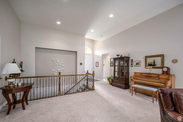 10453 N Canterbury Pl, Highland, UT 84003 - sitting room with an upstairs landing, carpet floors, recessed lighting, and a high ceiling