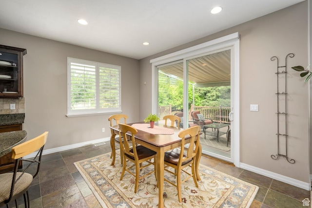 10453 N Canterbury Pl, Highland, UT 84003 - dining area with stone tile flooring and recessed lighting