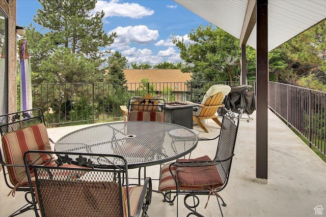 490 E 3475 N, North Ogden, UT 84414 - view of patio featuring outdoor dining space and a fire pit