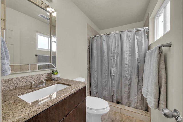 328 Pectol St, Washington, UT 84780 - full bathroom with vanity, a shower with shower curtain, and wood finished floors