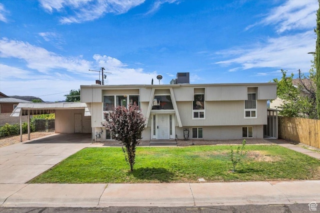 328 Pectol St, Washington, UT 84780 - view of front facade with a carport, driveway, and a chimney