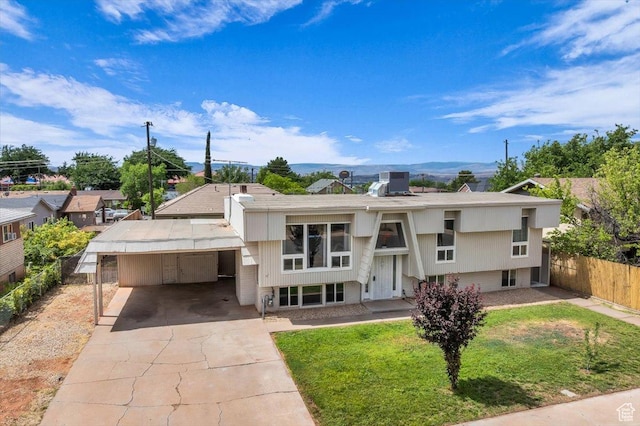 328 Pectol St, Washington, UT 84780 - view of front of property featuring a carport and concrete driveway