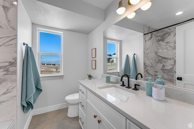 6957 W Farnsworth Peak Dr S Unit 314, West Jordan, UT 84081 - bathroom featuring vanity, a textured ceiling, a marble finish shower, and recessed lighting