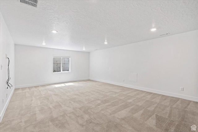 6153 W Poplar View Dr, South Jordan, UT 84009 - unfurnished room featuring light colored carpet, a textured ceiling, and recessed lighting