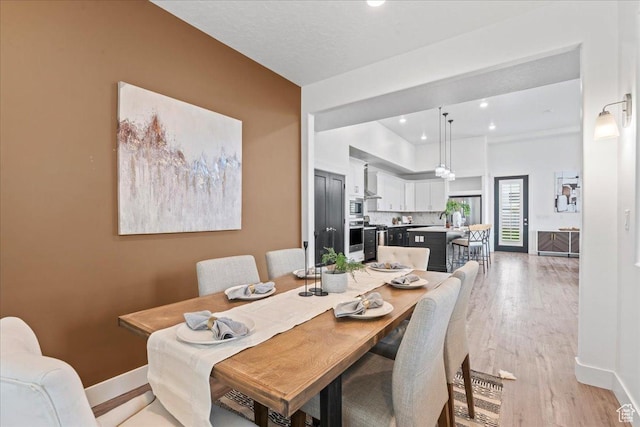 6153 W Poplar View Dr, South Jordan, UT 84009 - dining room featuring light wood finished floors and recessed lighting