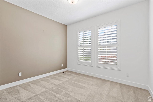 6153 W Poplar View Dr, South Jordan, UT 84009 - empty room featuring light colored carpet and a textured ceiling