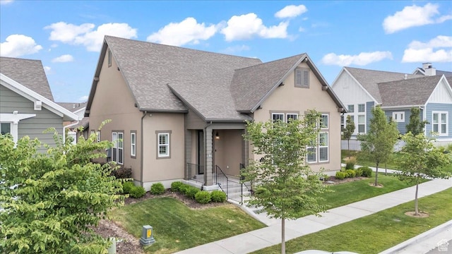 6153 W Poplar View Dr, South Jordan, UT 84009 - view of front of property featuring stucco siding, roof with shingles, and a front lawn