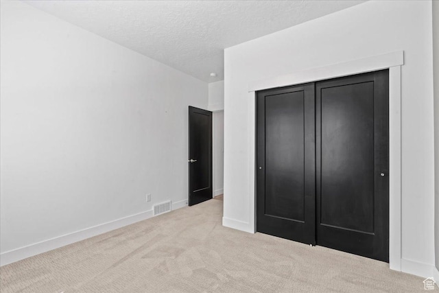 6153 W Poplar View Dr, South Jordan, UT 84009 - unfurnished bedroom with carpet flooring, a textured ceiling, and a closet
