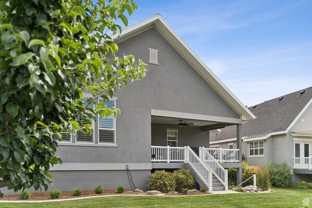 1968 W Silver Leaf Dr S, Mapleton, UT 84664 - view of front facade featuring ceiling fan, stucco siding, covered porch, and a front lawn