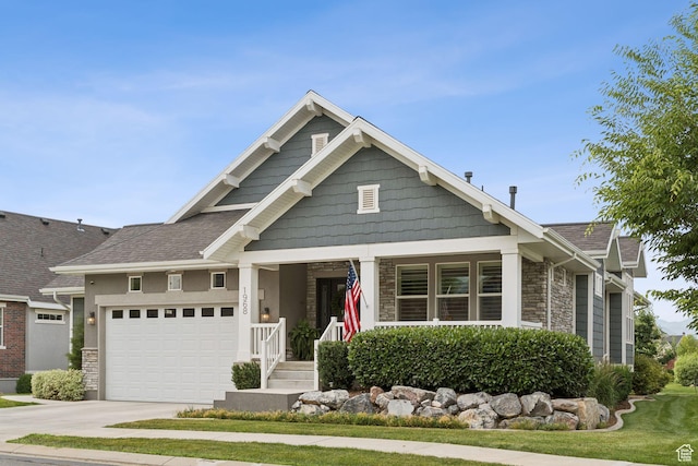 1968 W Silver Leaf Dr S, Mapleton, UT 84664 - craftsman inspired home with stone siding, an attached garage, driveway, and a porch