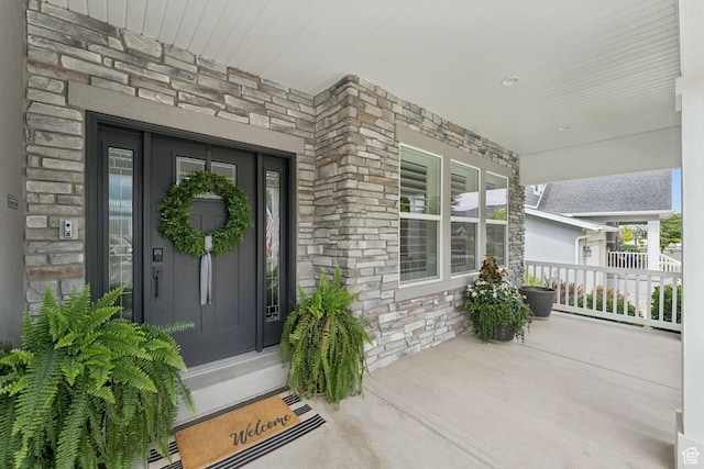 1968 W Silver Leaf Dr S, Mapleton, UT 84664 - view of exterior entry featuring stone siding and covered porch
