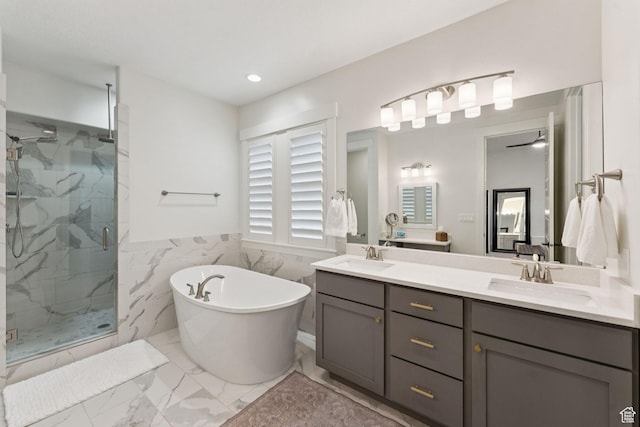 1968 W Silver Leaf Dr S, Mapleton, UT 84664 - bathroom featuring a marble finish shower, marble look tile flooring, double vanity, a freestanding bath, and a wainscoted wall