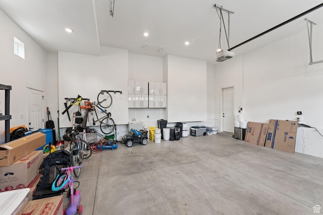 1968 W Silver Leaf Dr S, Mapleton, UT 84664 - garage with a garage door opener and recessed lighting