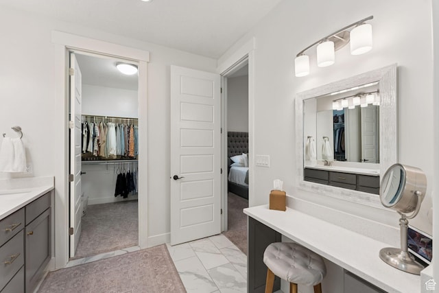 1968 W Silver Leaf Dr S, Mapleton, UT 84664 - ensuite bathroom featuring marble finish flooring, vanity, and a walk in closet