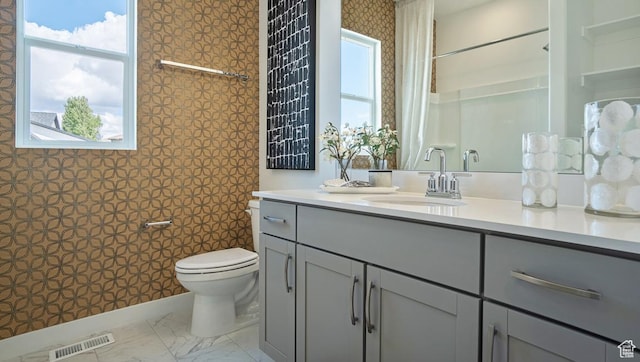 812 N 1750 E Unit 148, Salem, UT 84653 - bathroom featuring vanity, marble look tiles, wallpapered walls, and a shower