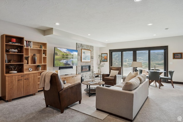 11411 N White Tail Ct, Hideout, UT 84036 - living room featuring light carpet, recessed lighting, a stone fireplace, and a textured ceiling