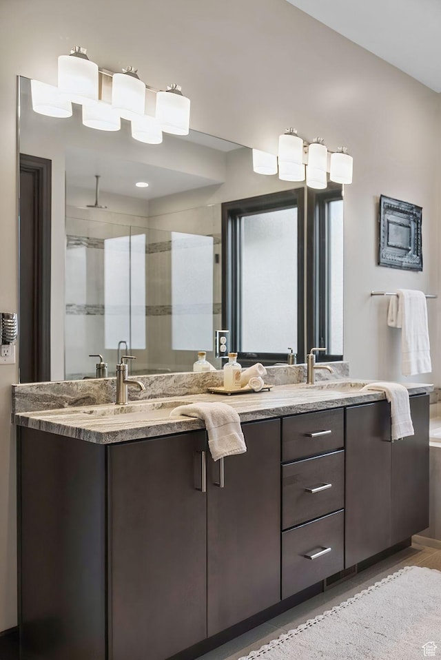 11411 N White Tail Ct, Hideout, UT 84036 - full bath with double vanity and a shower stall