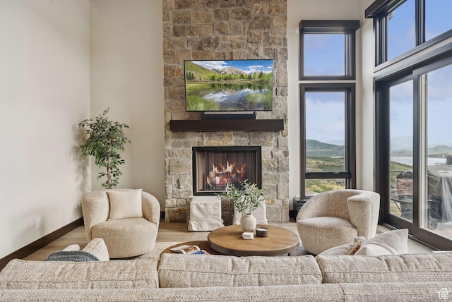 11411 N White Tail Ct, Hideout, UT 84036 - living room with a fireplace and wood finished floors
