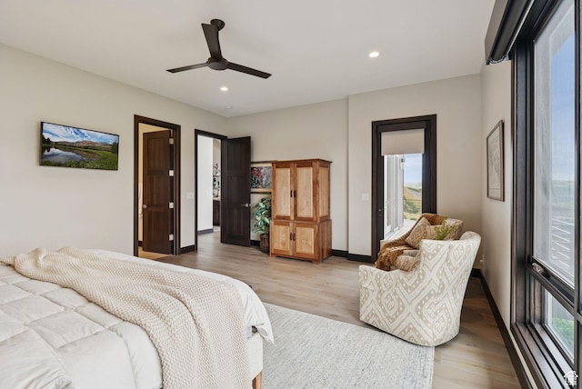 11411 N White Tail Ct, Hideout, UT 84036 - bedroom with multiple windows, light wood-type flooring, recessed lighting, and a ceiling fan