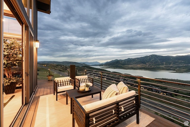 11411 N White Tail Ct, Hideout, UT 84036 - balcony with a water and mountain view and an outdoor hangout area