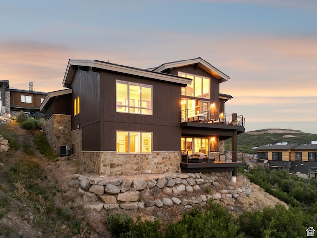 11411 N White Tail Ct, Hideout, UT 84036 - view of front of property with a balcony and stone siding