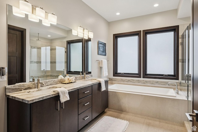 11411 N White Tail Ct, Hideout, UT 84036 - full bathroom with a stall shower, a bath, double vanity, recessed lighting, and tile patterned flooring