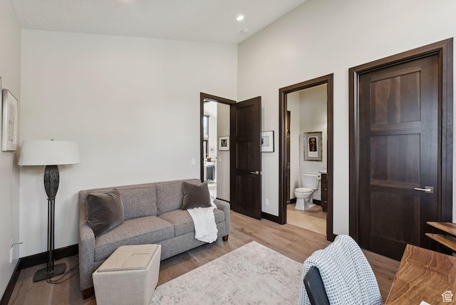 11411 N White Tail Ct, Hideout, UT 84036 - living area featuring light wood-type flooring, recessed lighting, and vaulted ceiling