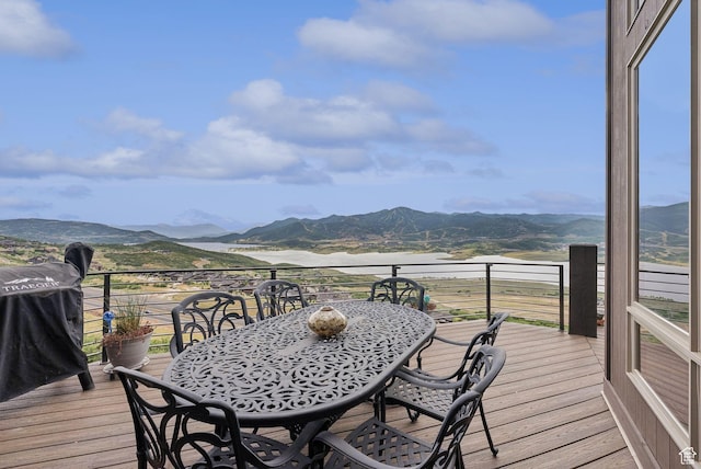 11411 N White Tail Ct, Hideout, UT 84036 - deck featuring a mountain view, grilling area, and outdoor dining space