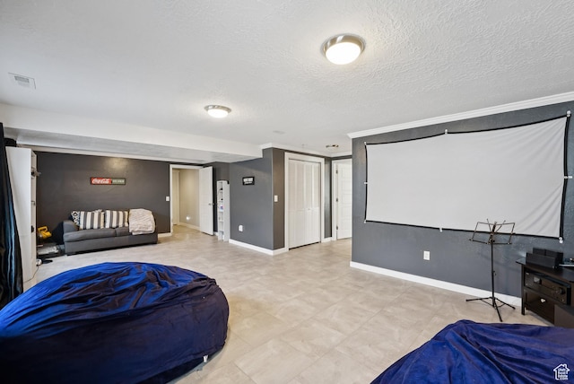 979 N Cold Creek Way, Layton, UT 84041 - cinema with a textured ceiling and ornamental molding
